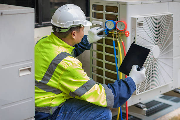 Professional Hvac technician working in Baldwin, NY